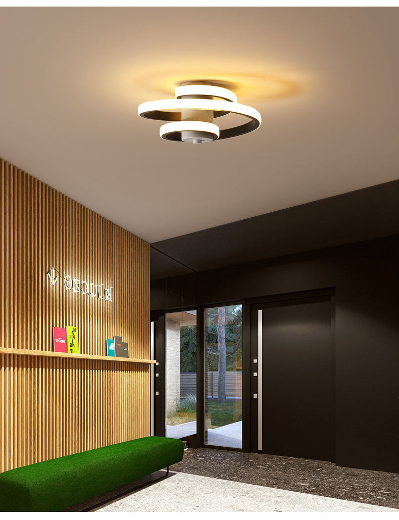 Lámpara de techo con iluminación LED de metal sencilla y moderna.
