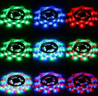 Tira  de luz LED RGB , con control  remoto , que cambia de color con adaptor .