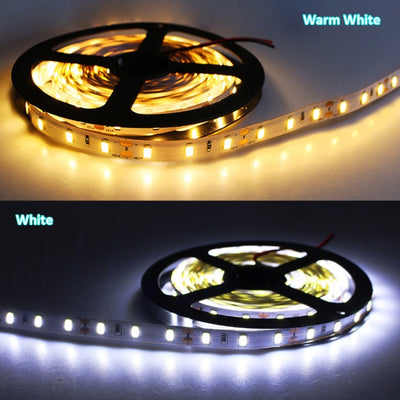 Tira  de luz LED RGB , con control  remoto , que cambia de color con adaptor .